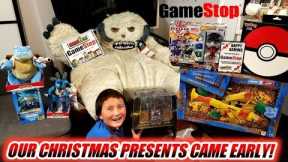FATHER SON OPEN THE BEST CHRISTMAS PRESENTS FROM GAMESTOP! NEW POKEMON CARDS, FORTNITE & STAR WARS!